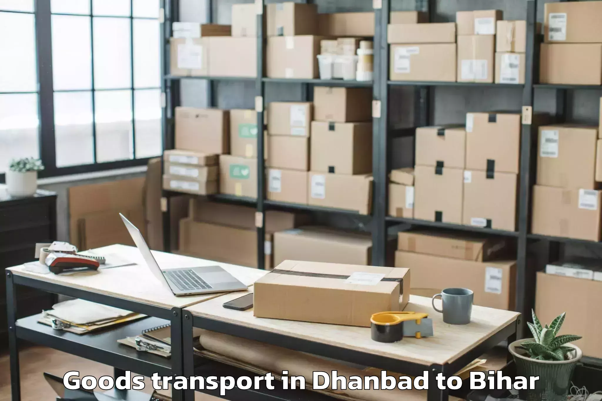 Easy Dhanbad to Lahladpur Goods Transport Booking